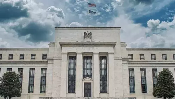 Federal Reserve's Expanding Balance Sheet and Debt Absorption Challenges