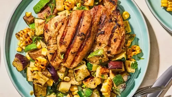 Flavorful Herb-Marinated Chicken Thighs with Grilled Vegetable Medley